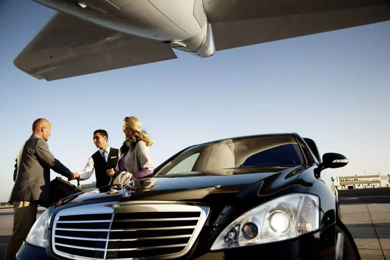 Chauffeur greeting corporate client at the airport